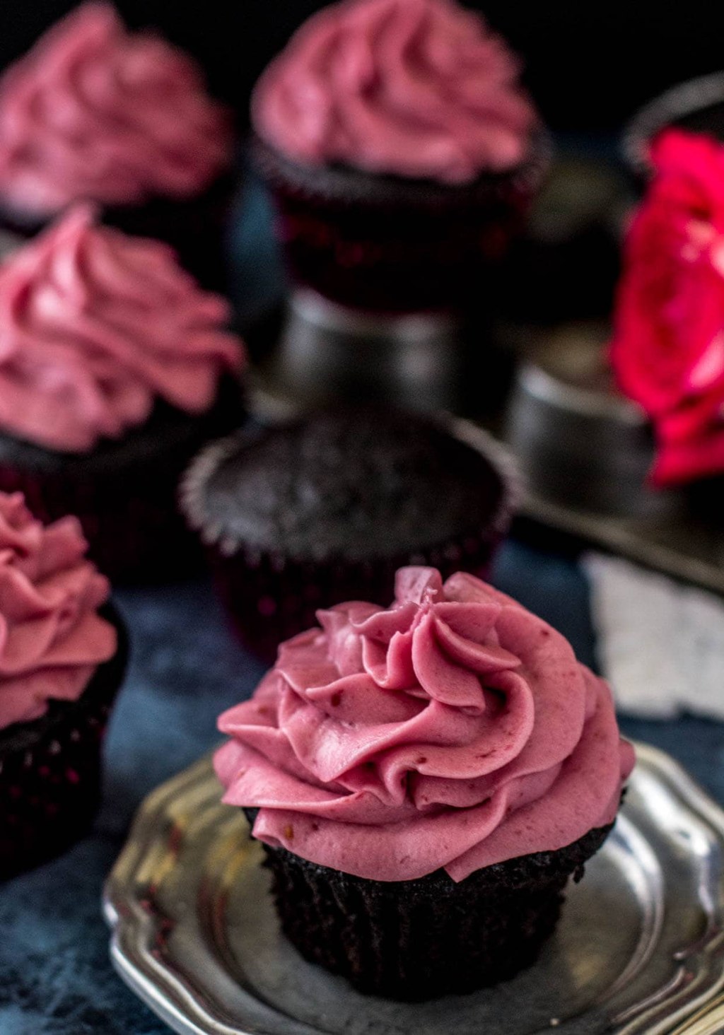 Picture of: Dark Chocolate Cupcakes with Fresh Raspberry Frosting – Sugar Spun Run