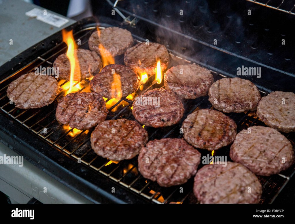 Picture of: Flame grilled beef burgers on -Fotos und -Bildmaterial in hoher