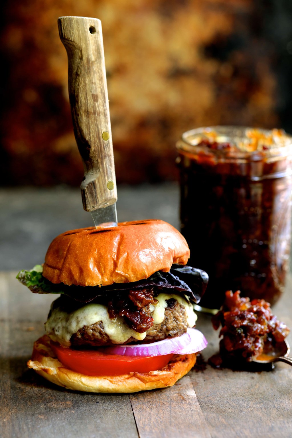 Picture of: Grilled Burgers with Bacon Tomato Jam and Smoked Gouda